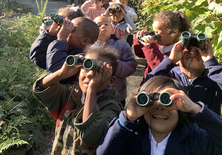 children with binoculars