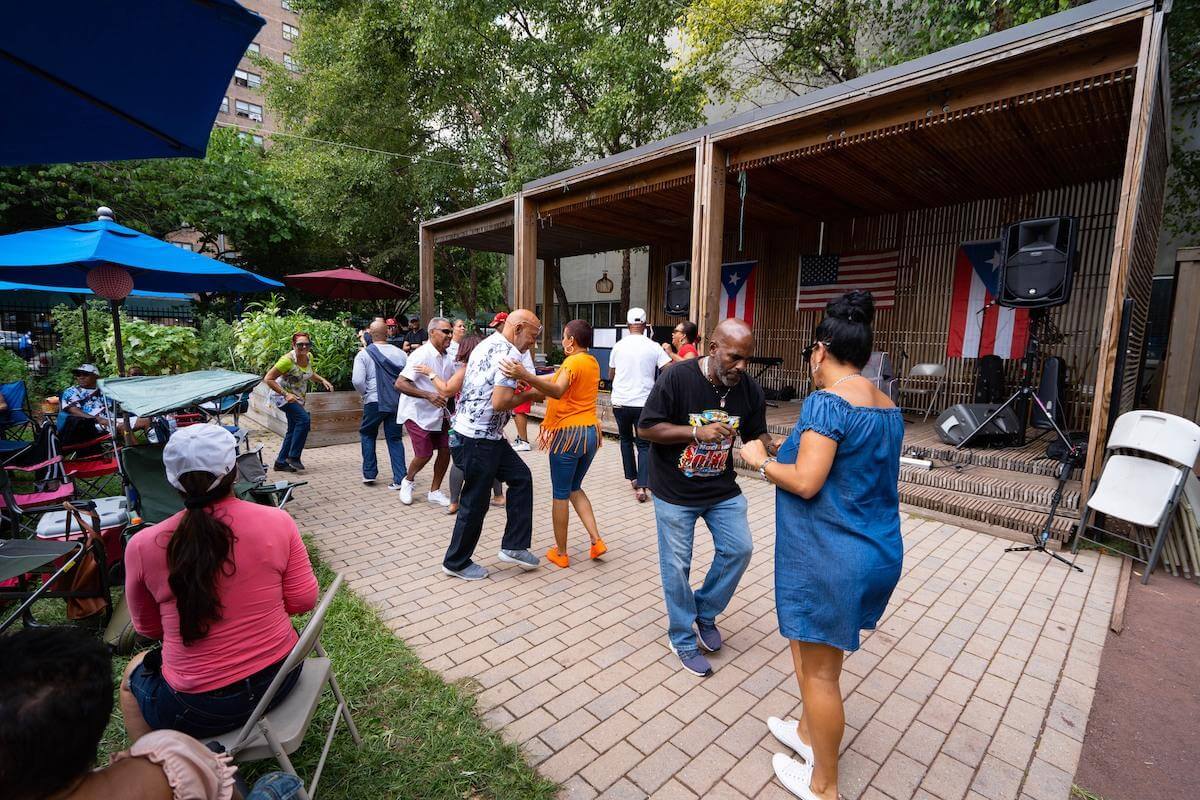 community dancing in garden