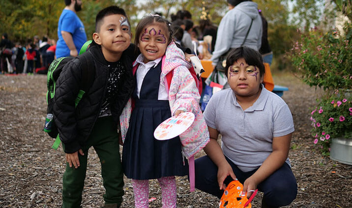 children smiling at festival