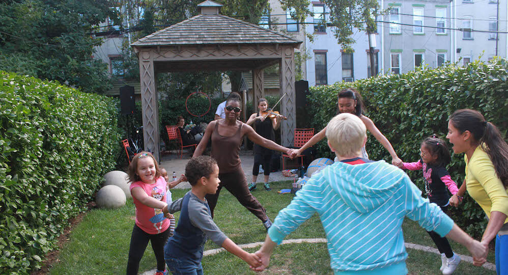 kids dancing in garden