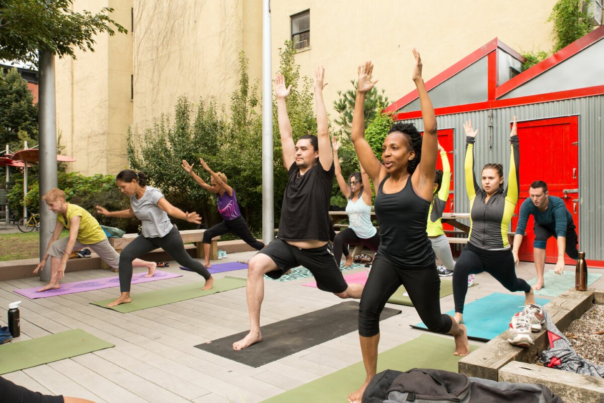 Group of people doing yoga in East Harlem