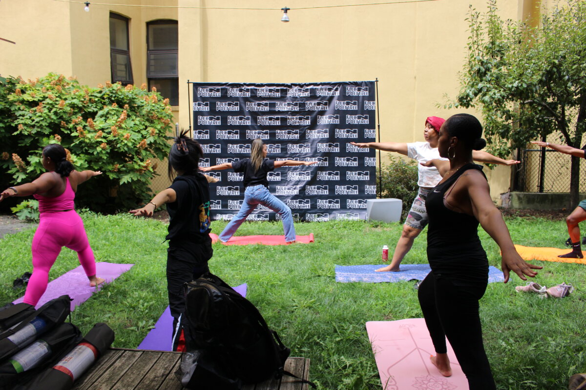 people doing yoga in el barrio