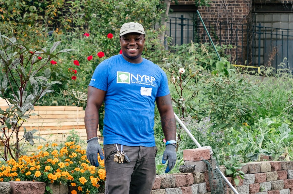 person smiling in garden