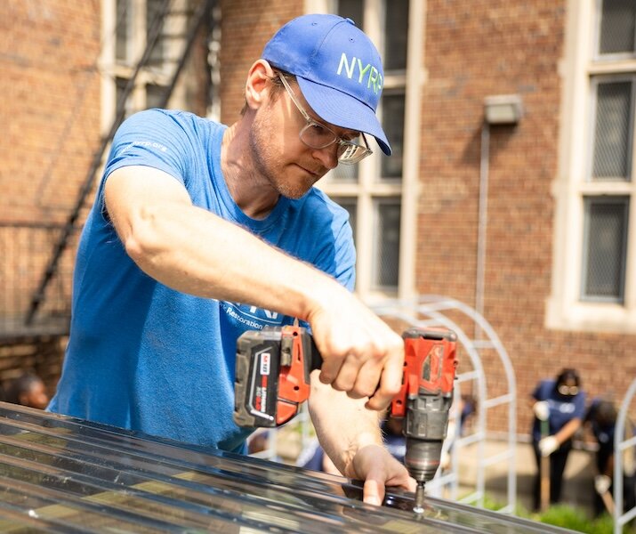 person with drill